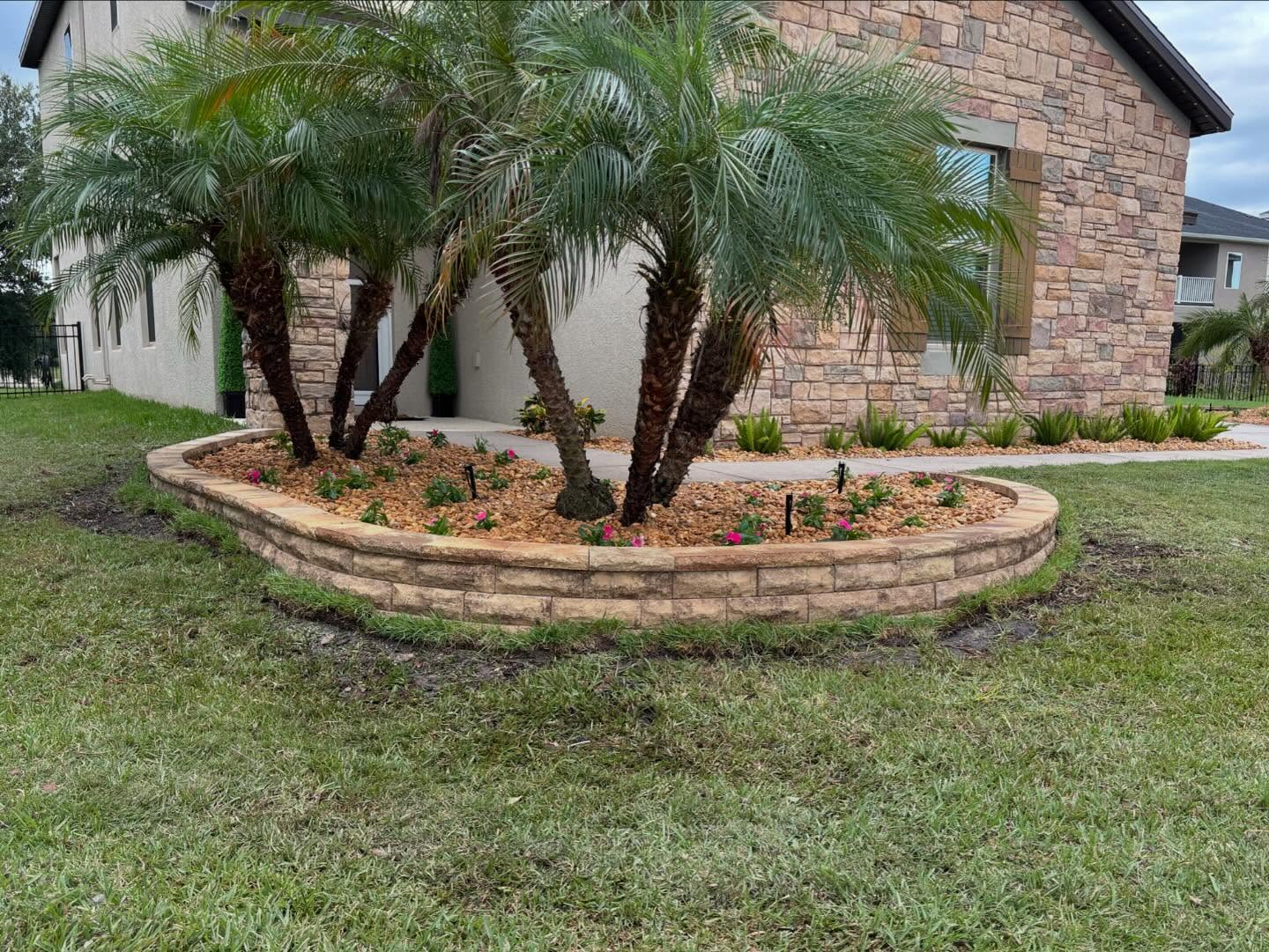 Curved paver patio with center firepit